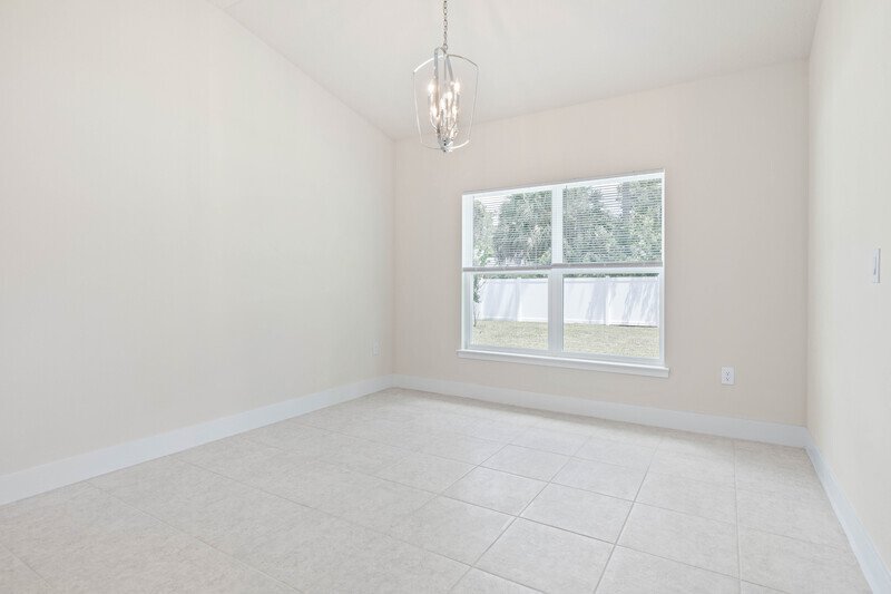 FULLY FENCED, LIKE NEW 3/2/2 IN POPULAR PINE GROVE property image