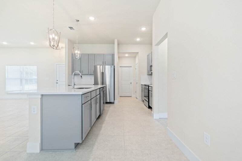 FULLY FENCED, LIKE NEW 3/2/2 IN POPULAR PINE GROVE property image