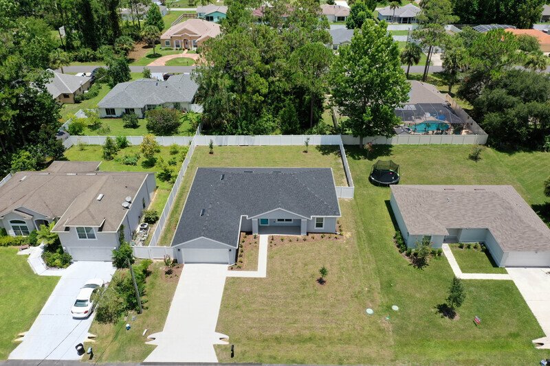 FULLY FENCED, LIKE NEW 3/2/2 IN POPULAR PINE GROVE property image