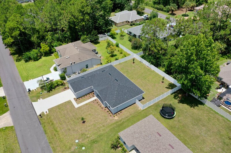 FULLY FENCED, LIKE NEW 3/2/2 IN POPULAR PINE GROVE property image