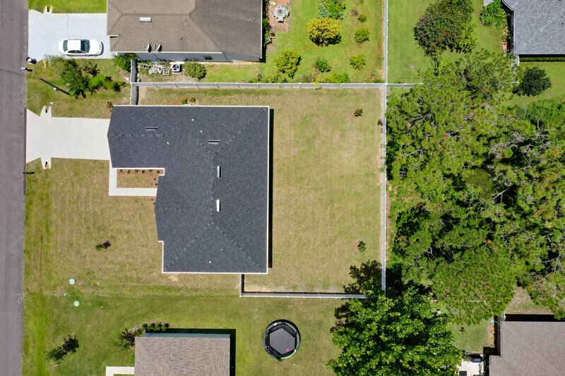 FULLY FENCED, LIKE NEW 3/2/2 IN POPULAR PINE GROVE property image