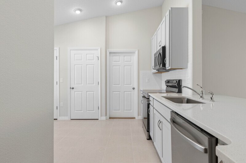 FULLY FENCED, BRAND NEW 4/2/2 IN POPULAR BELLE TERRE property image