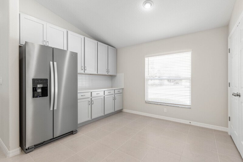 FULLY FENCED, BRAND NEW 4/2/2 IN POPULAR BELLE TERRE property image