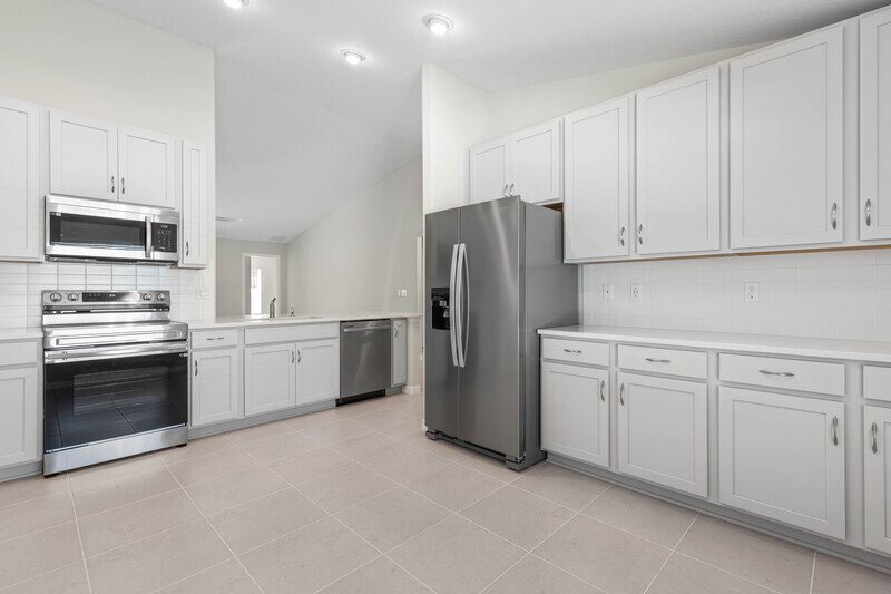 FULLY FENCED, BRAND NEW 4/2/2 IN POPULAR BELLE TERRE property image