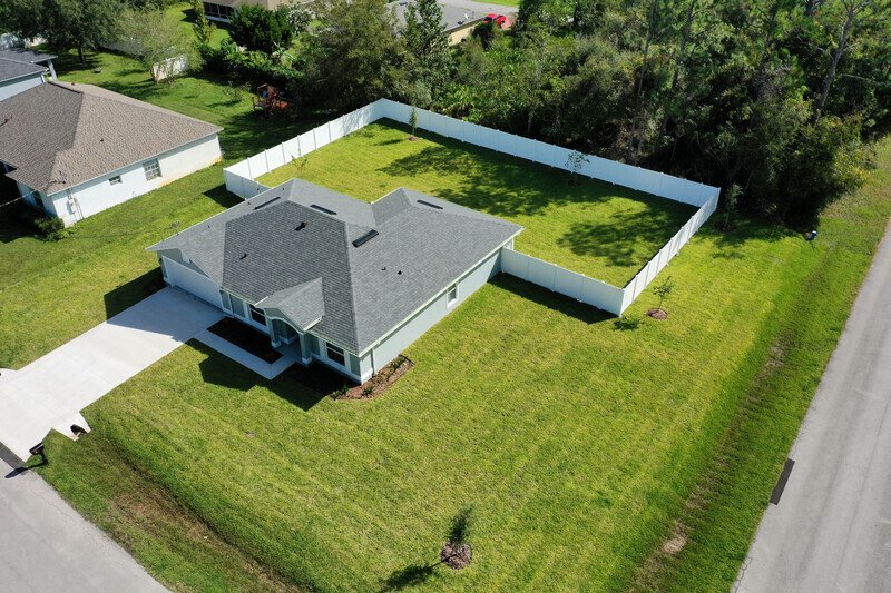 FULLY FENCED, BRAND NEW 4/2/2 IN POPULAR BELLE TERRE property image