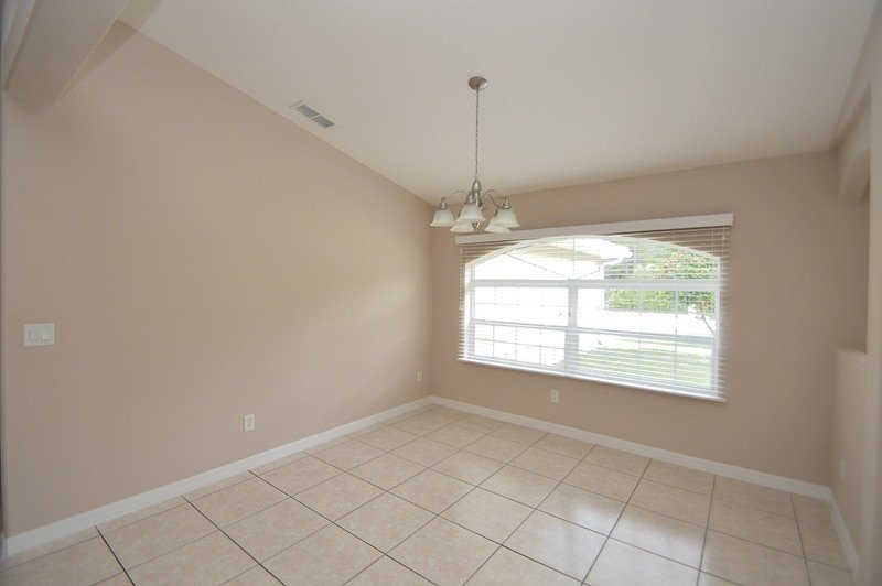 FULLY FENCED 3/2/2 POOL HOME IN THE HEART OF PALM COAST property image