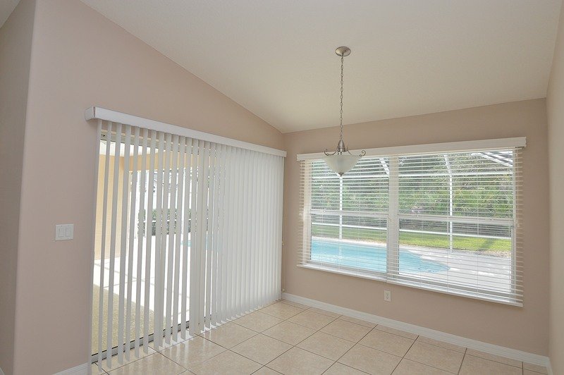 FULLY FENCED 3/2/2 POOL HOME IN THE HEART OF PALM COAST property image