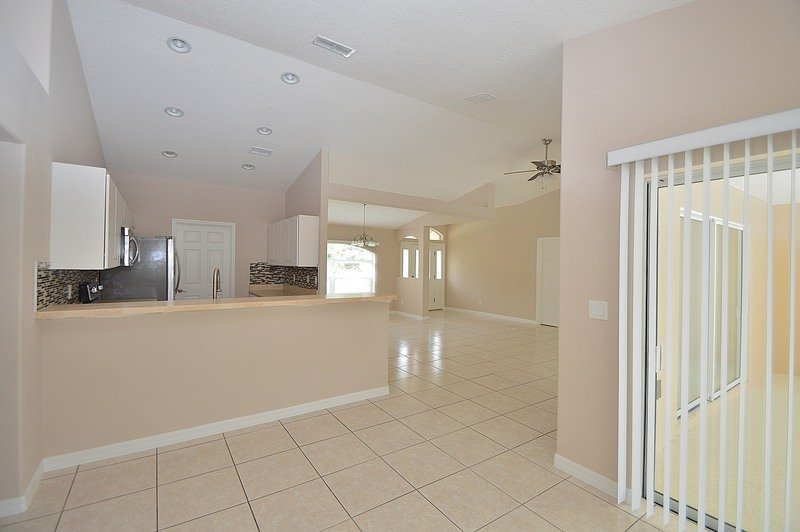 FULLY FENCED 3/2/2 POOL HOME IN THE HEART OF PALM COAST property image