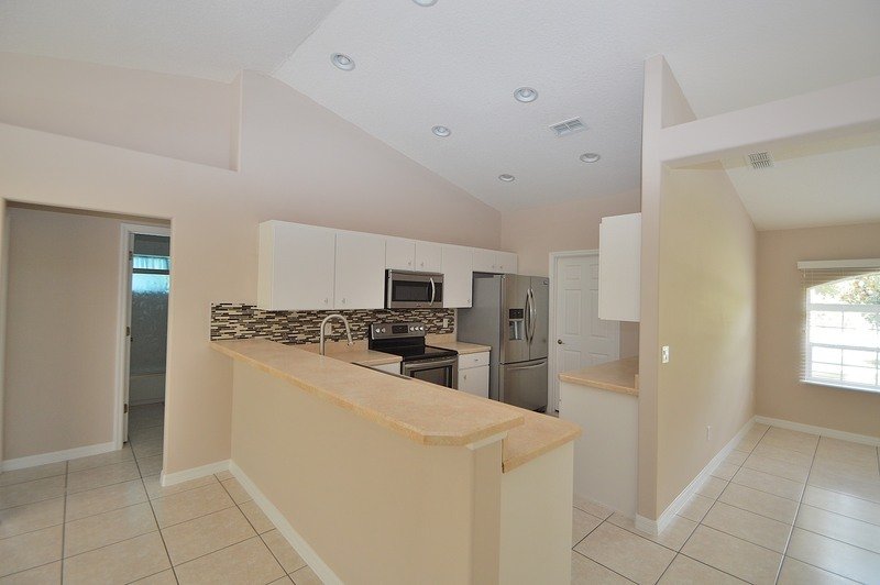 FULLY FENCED 3/2/2 POOL HOME IN THE HEART OF PALM COAST property image