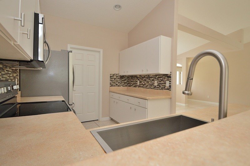 FULLY FENCED 3/2/2 POOL HOME IN THE HEART OF PALM COAST property image