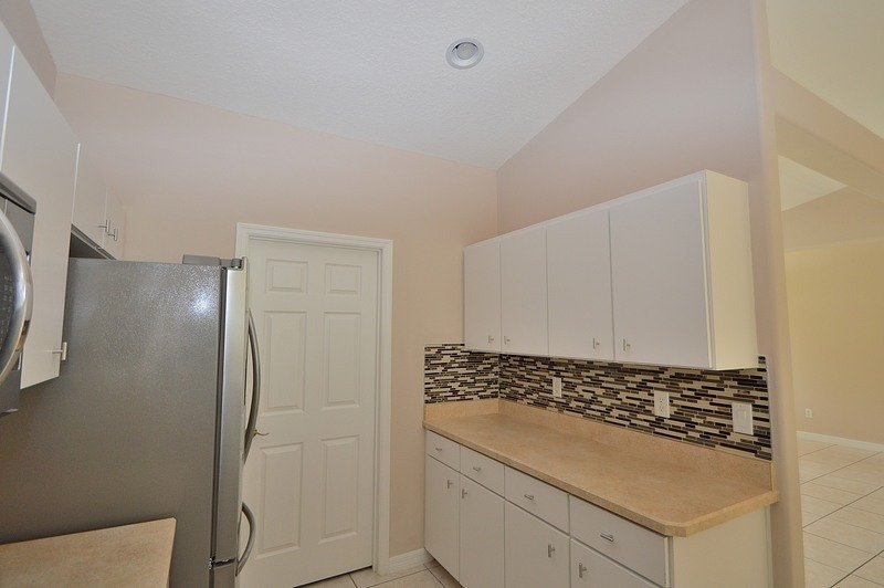 FULLY FENCED 3/2/2 POOL HOME IN THE HEART OF PALM COAST property image