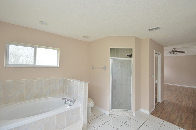 FULLY FENCED 3/2/2 POOL HOME IN THE HEART OF PALM COAST property image