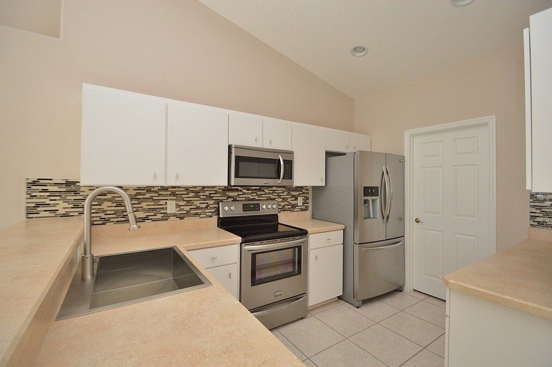 FULLY FENCED 3/2/2 POOL HOME IN THE HEART OF PALM COAST property image