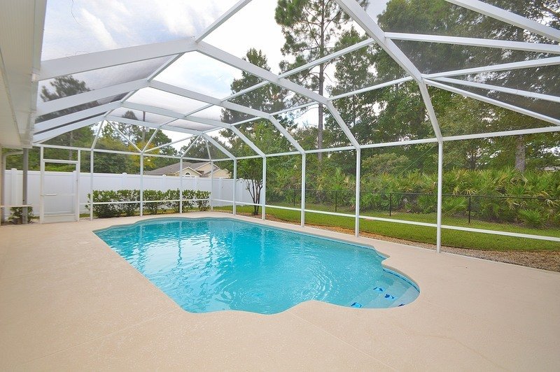 FULLY FENCED 3/2/2 POOL HOME IN THE HEART OF PALM COAST property image