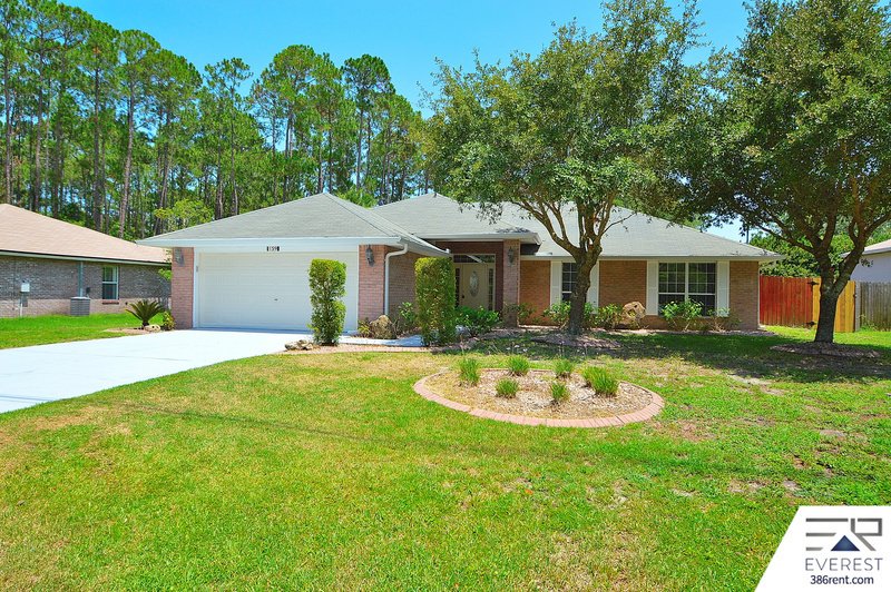 FULLY FENCED 4/2/2 POOL HOME IN THE HEART OF PALM COAST property image