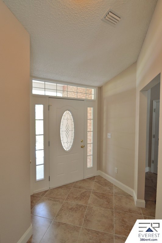 FULLY FENCED 4/2/2 POOL HOME IN THE HEART OF PALM COAST property image