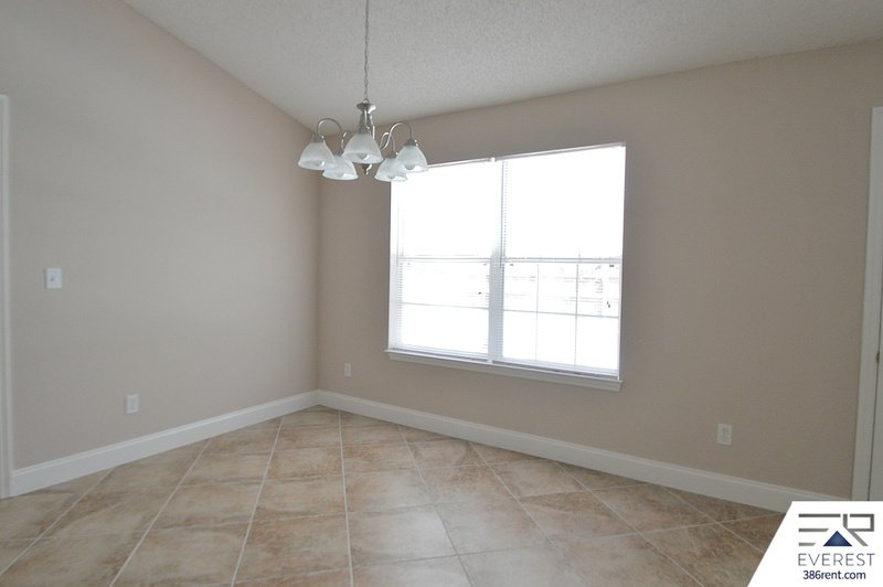 FULLY FENCED 4/2/2 POOL HOME IN THE HEART OF PALM COAST property image