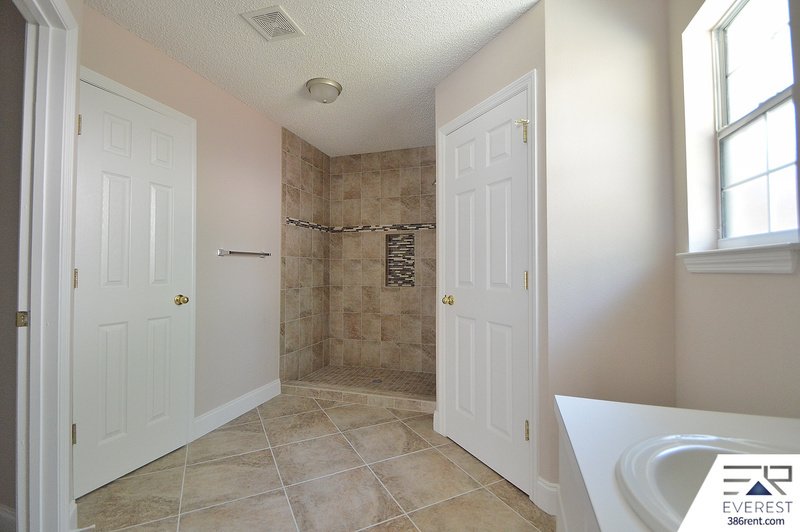 FULLY FENCED 4/2/2 POOL HOME IN THE HEART OF PALM COAST property image