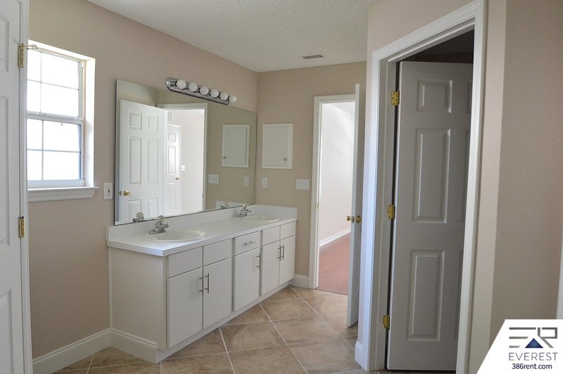 FULLY FENCED 4/2/2 POOL HOME IN THE HEART OF PALM COAST property image