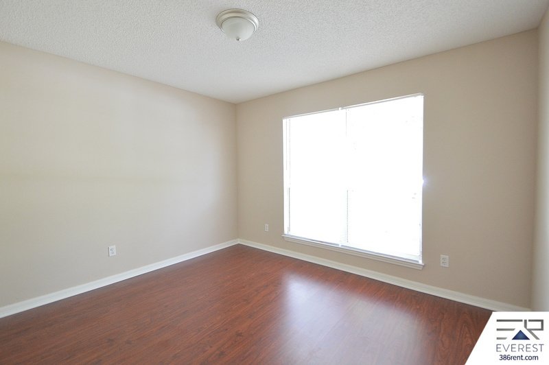 FULLY FENCED 4/2/2 POOL HOME IN THE HEART OF PALM COAST property image