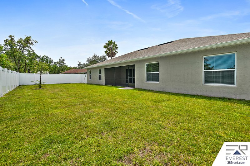 FULLY FENCED, LIKE NEW 4/2/2 IN DESIREABLE MATANZAS WOODS property image