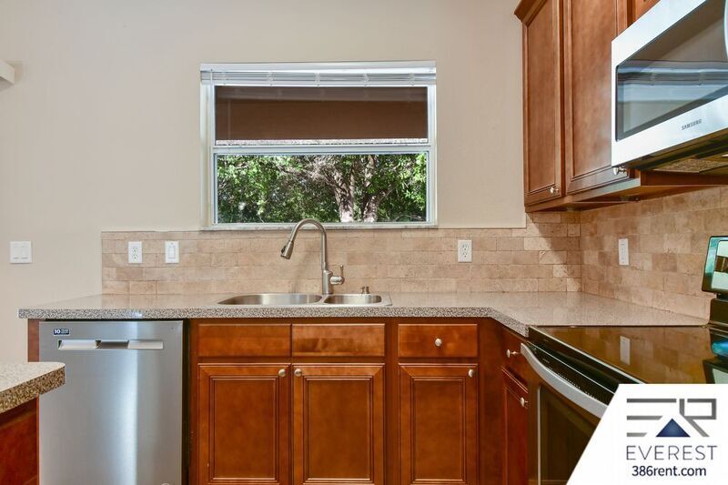 FULLY FENCED 3/2/2 TOWN HOME IN THE HEART OF PALM COAST property image