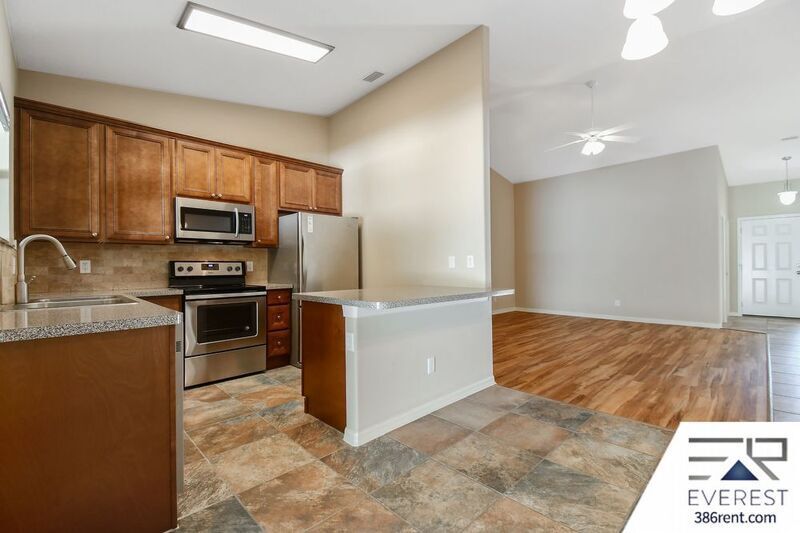 FULLY FENCED 3/2/2 TOWN HOME IN THE HEART OF PALM COAST property image