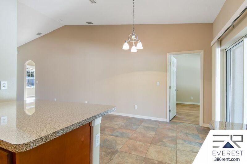 FULLY FENCED 3/2/2 TOWN HOME IN THE HEART OF PALM COAST property image