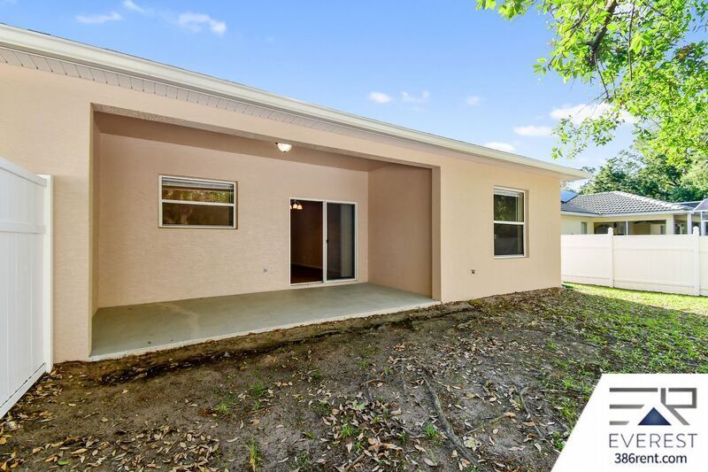 FULLY FENCED 3/2/2 TOWN HOME IN THE HEART OF PALM COAST property image