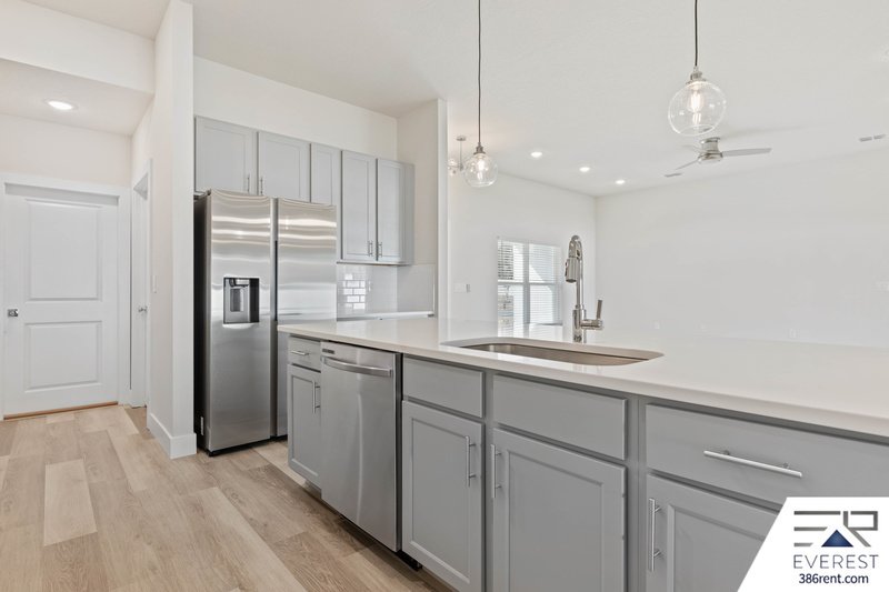 FULLY FENCED, UPGRADED 3/2/2 IN DESIRABLE PINE GROVE property image