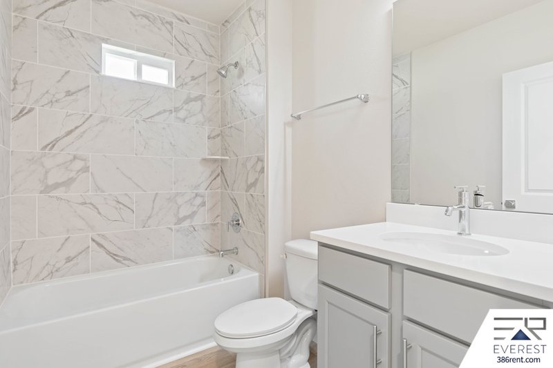 FULLY FENCED, UPGRADED 3/2/2 IN DESIRABLE PINE GROVE property image