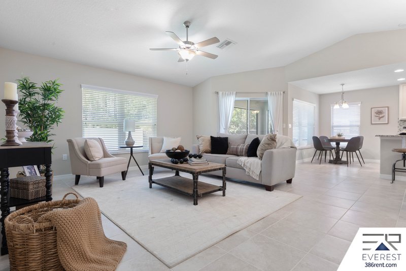 FULLY FENCED, LIKE NEW 3/2/2 IN DESIRABLE PINE LAKES property image