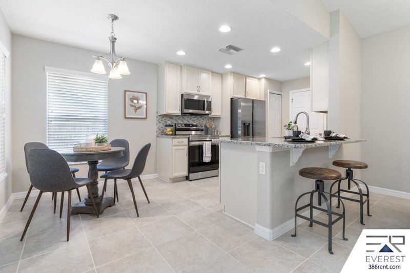 FULLY FENCED, LIKE NEW 3/2/2 IN DESIRABLE PINE LAKES property image