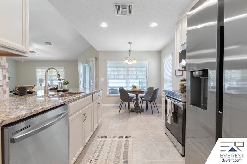 FULLY FENCED, LIKE NEW 3/2/2 IN DESIRABLE PINE LAKES property image