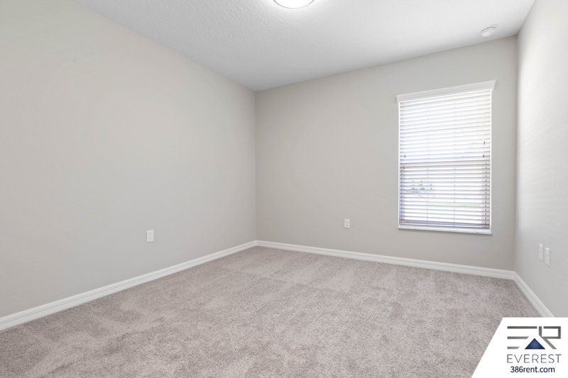 FULLY FENCED, LIKE NEW 3/2/2 IN DESIRABLE PINE LAKES property image