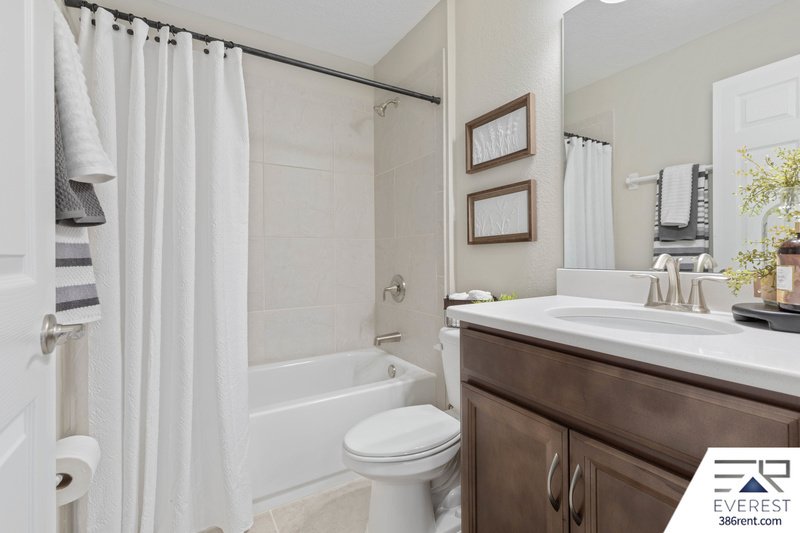 FULLY FENCED, LIKE NEW 3/2/2 IN DESIRABLE PINE LAKES property image