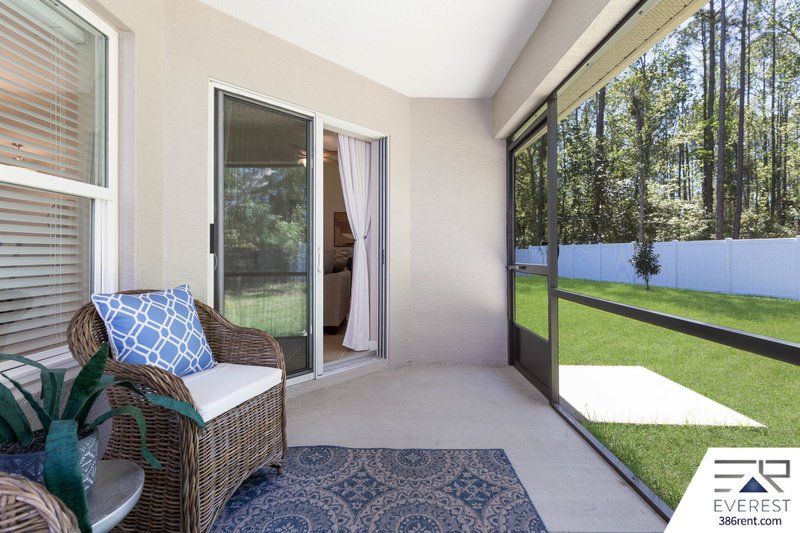 FULLY FENCED, LIKE NEW 3/2/2 IN DESIRABLE PINE LAKES property image