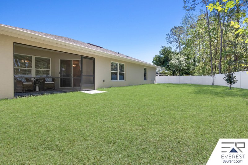 FULLY FENCED, LIKE NEW 3/2/2 IN DESIRABLE PINE LAKES property image