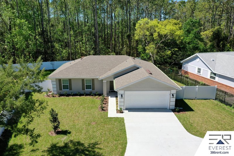 FULLY FENCED, LIKE NEW 3/2/2 IN DESIRABLE PINE LAKES property image