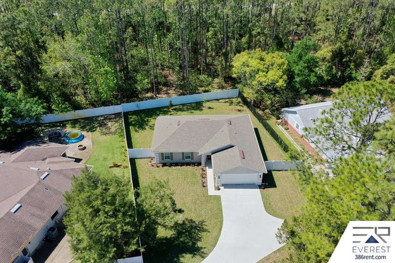 FULLY FENCED, LIKE NEW 3/2/2 IN DESIRABLE PINE LAKES property image