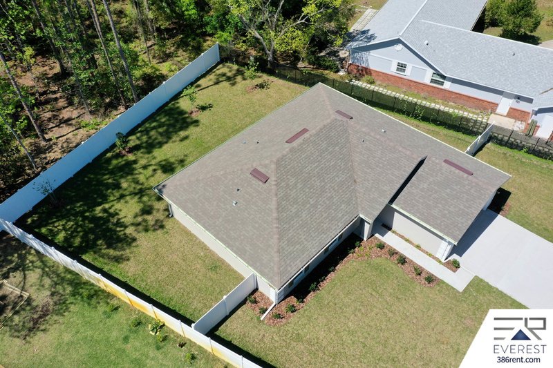 FULLY FENCED, LIKE NEW 3/2/2 IN DESIRABLE PINE LAKES property image