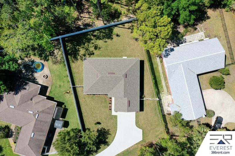 FULLY FENCED, LIKE NEW 3/2/2 IN DESIRABLE PINE LAKES property image