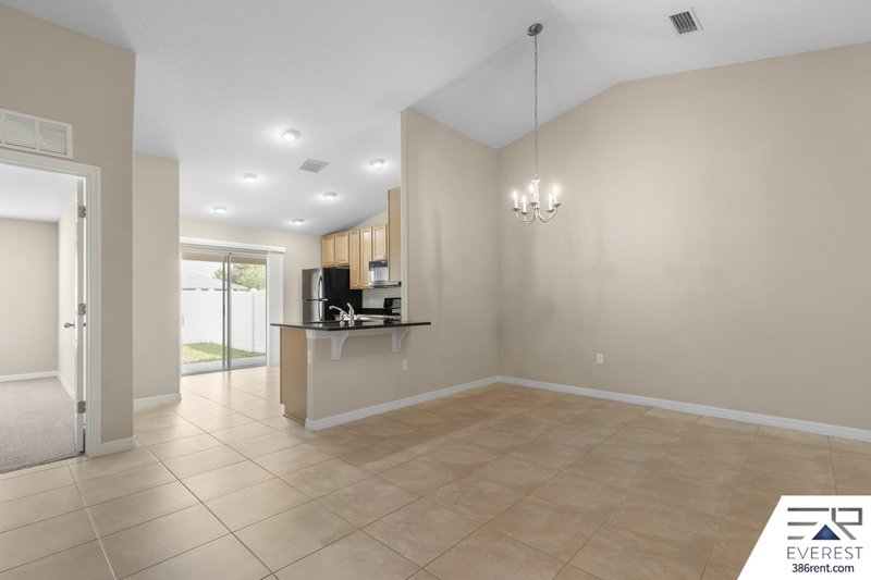 FULLY FENCED, LIKE NEW 3/2/1 IN DESIRABLE MATANZAS WOODS property image