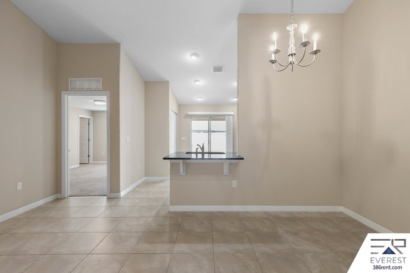 FULLY FENCED, LIKE NEW 3/2/1 IN DESIRABLE MATANZAS WOODS property image