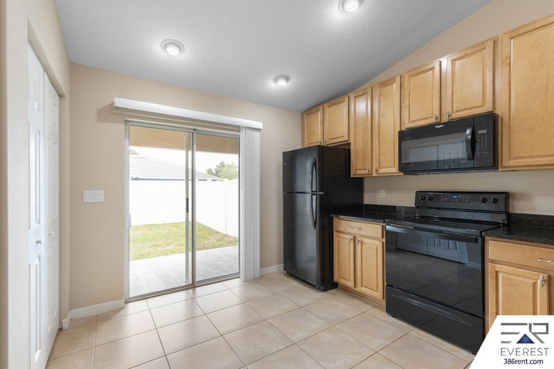 FULLY FENCED, LIKE NEW 3/2/1 IN DESIRABLE MATANZAS WOODS property image