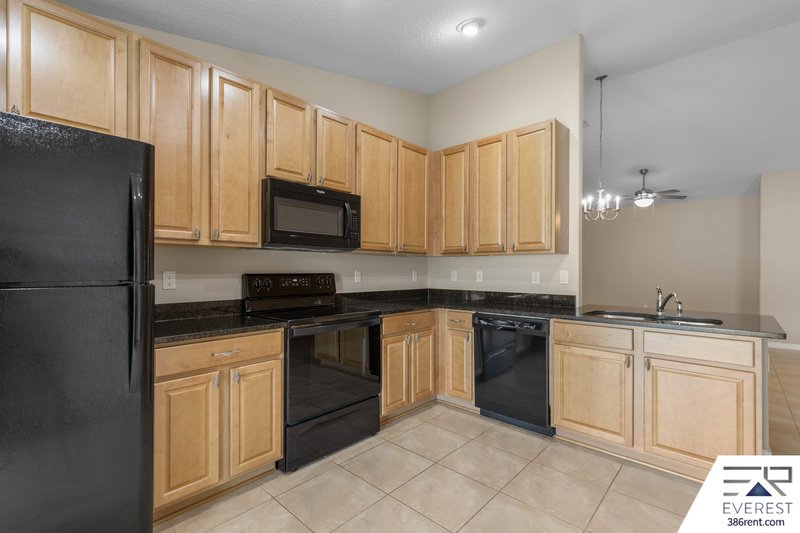 FULLY FENCED, LIKE NEW 3/2/1 IN DESIRABLE MATANZAS WOODS property image
