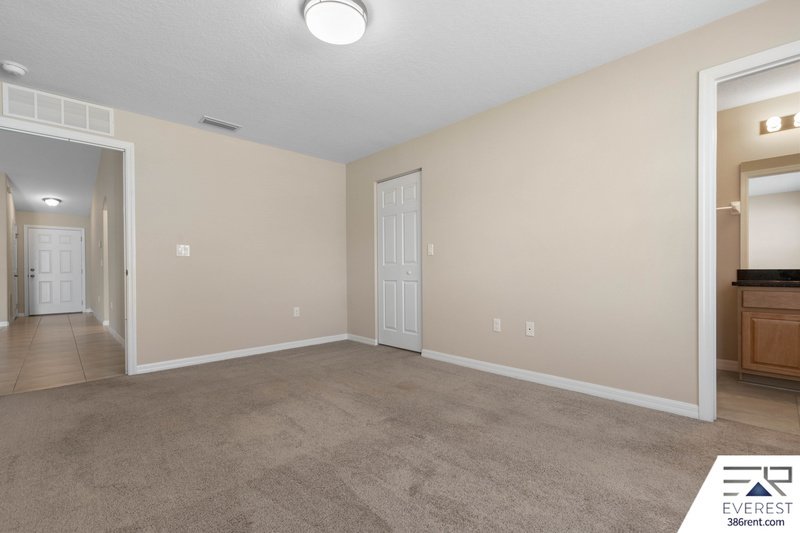 FULLY FENCED, LIKE NEW 3/2/1 IN DESIRABLE MATANZAS WOODS property image