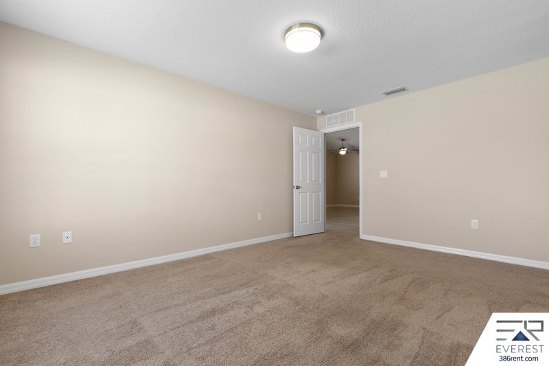 FULLY FENCED, LIKE NEW 3/2/1 IN DESIRABLE MATANZAS WOODS property image