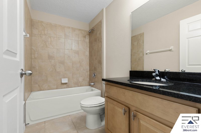 FULLY FENCED, LIKE NEW 3/2/1 IN DESIRABLE MATANZAS WOODS property image