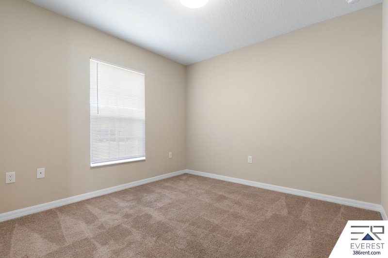 FULLY FENCED, LIKE NEW 3/2/1 IN DESIRABLE MATANZAS WOODS property image